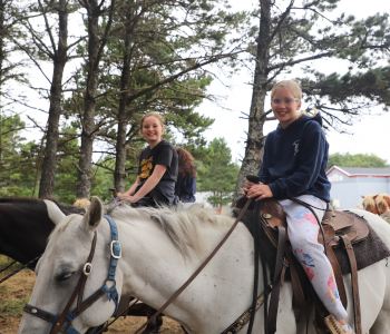 Adina-and-Eden-horseback-riding-2